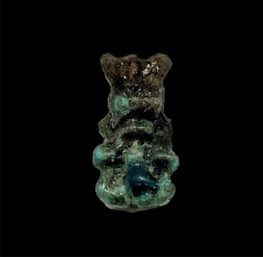 Pendant amulet of the god Bes of ancient Egypt